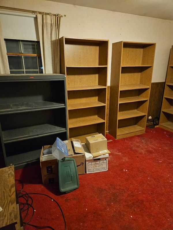 cleared out office with empty shelves
